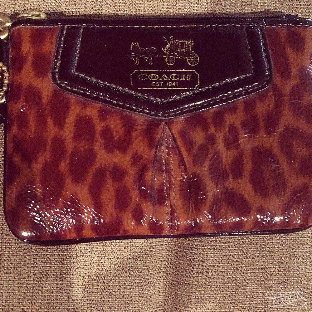 Coach leather small wristlet purse. Night out must